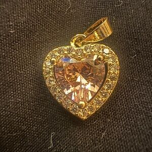 Radiant Gold Heart Necklace with Pink Gemstone